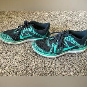 Women’s teal and gray Nikes